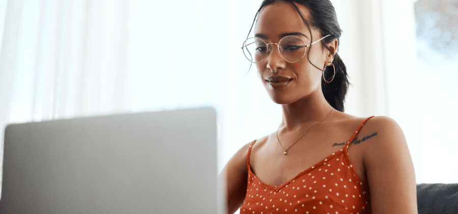 business owner at their computer updating WordPress website plugins